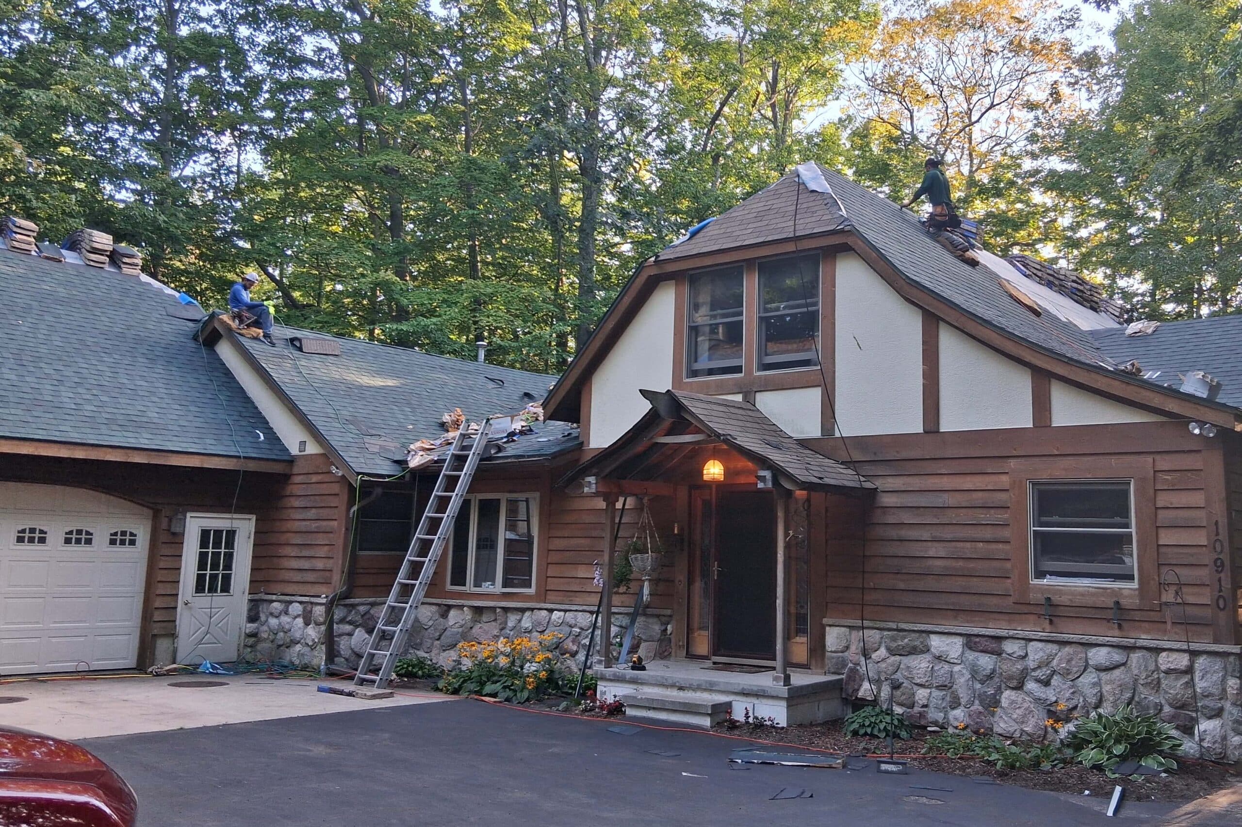 roofing contractor beulah mi — roof repair on two-story home